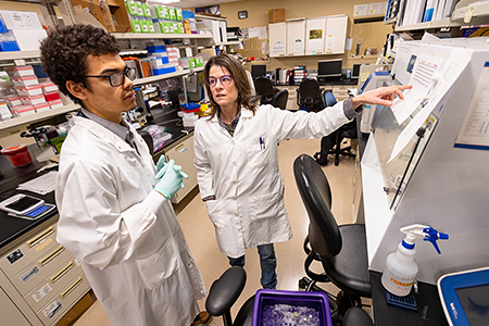 Researchers reviewing some paperwork.