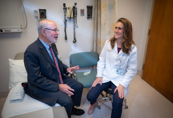 Patient and provider talking in clinic room