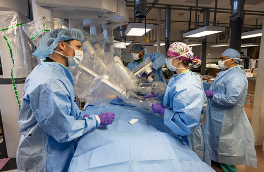 Surgeons performing brain tumor surgery.