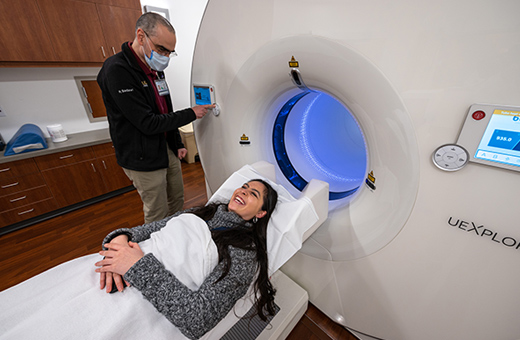 Woman going into PET scan before epilepsy surgery.