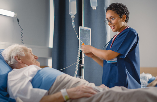 Patient recovering in hospital bed after lung cancer surgery.