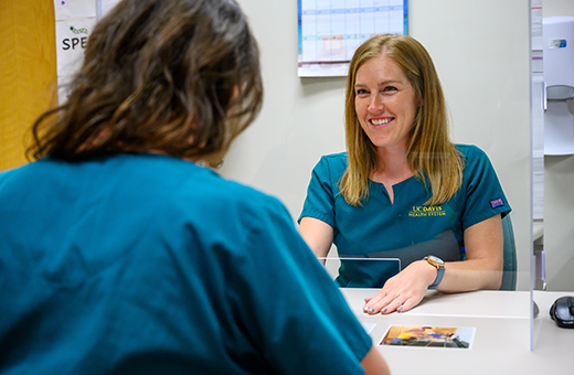 Rehabilitation specialists working with a patient.