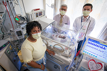 Frank Ing, Jay Yeh and Candra Taylor with baby Cedric.