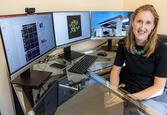 Bethany Cummings at her desk