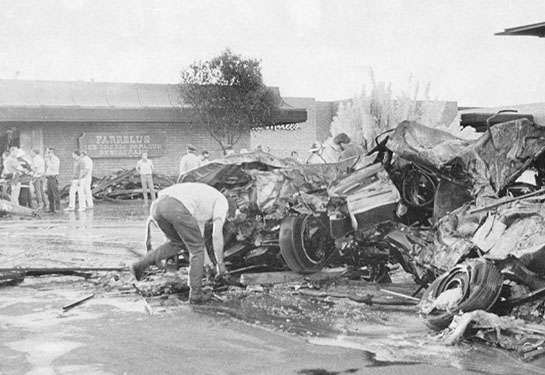 Wreckage of plane that crashed into ice cream parlor