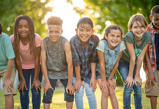 Group of diverse children in a row 