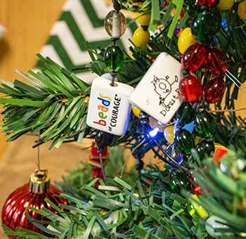 Close up of tree showing Beads of Courage and Donut Dash beads.