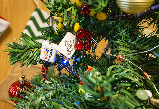 Close up of tree showing Beads of Courage and Donut Dash beads.