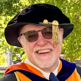 Dean Stephen Cavanagh in graduation attire