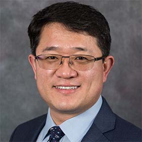 Aijun Wang, professor of surgery and biomedical engineering