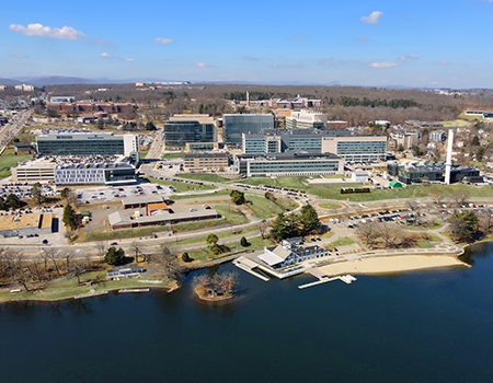 An aerial photograph shows a series of buildings that make up the UMass Chan Medical School campus in Worcester, Mass.