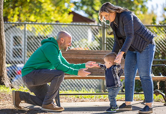 Mom, dad and Jared in the park