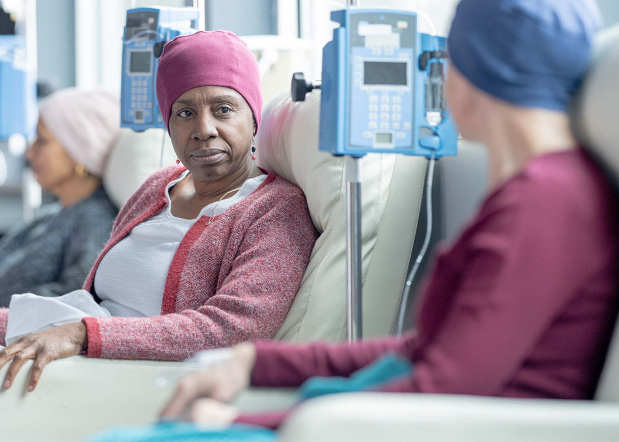 Women with head scarfs getting treatment