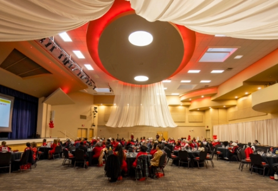 Room with tables lit in red.