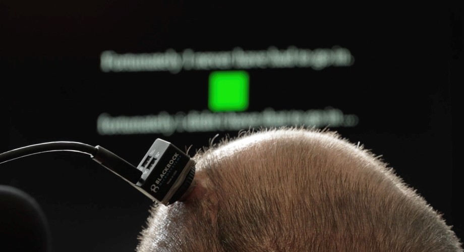 A man's head showing a biomedical device