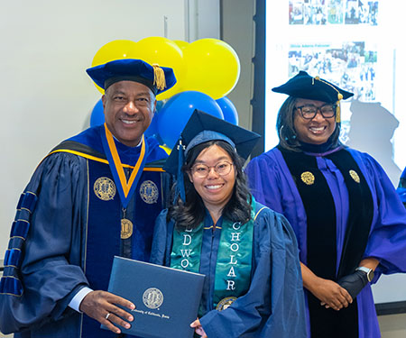 A woman gets her diploma