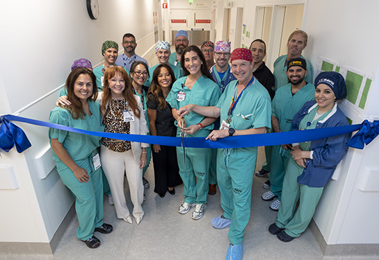 Members of the Perioperative team cut a ribbon to celebrate the 48X Complex's first surgery