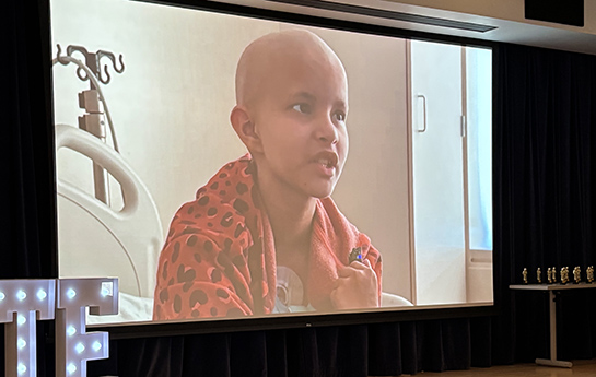 Child on big screen