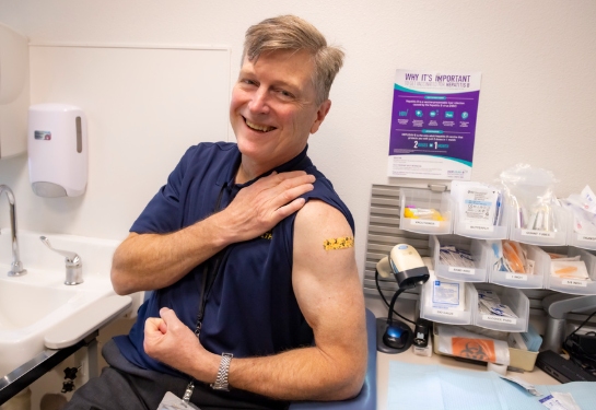 bruce hall with bandaid on arm