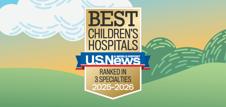 U.S. News badge with green illustrated hills behind it