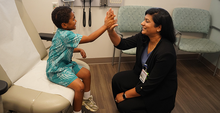One boy is hugging his brother.