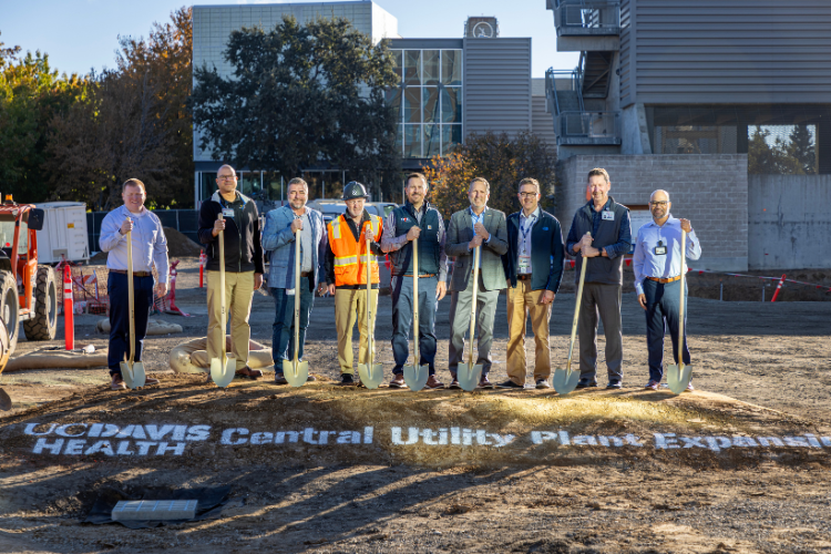 Leadership stand will shovels at the Central Utility Plant groundbreaking ceremony