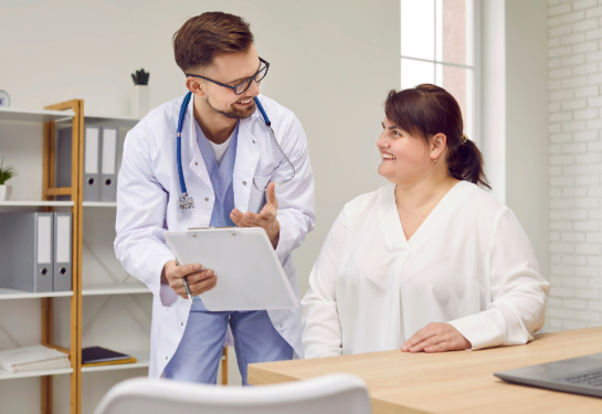 Overweight woman having consultation at doctor's office.