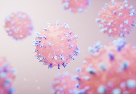 A 3D illustration of pink immune cells with blue spikes floating against a soft, light background.