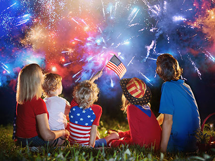 family watching fireworks for fourth of july and not getting burned