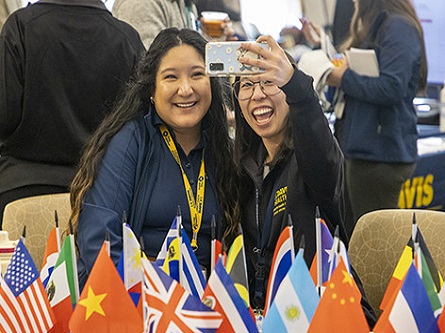 attendees snap a selfie during the Principles of Community kickoff event