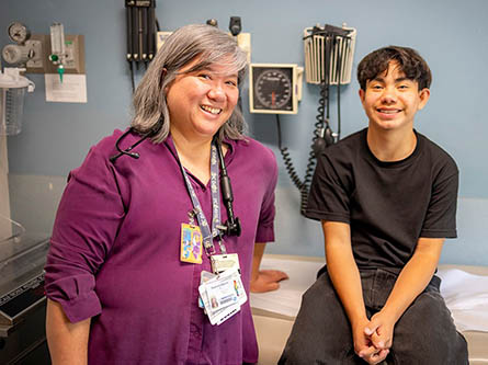 Justin and his doctor, Stephanie Tram-Anh Nguyen.