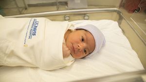 Newborn in a UC Davis Health sleep sack.