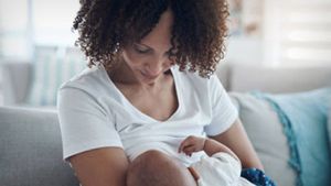 Mother breastfeeding baby