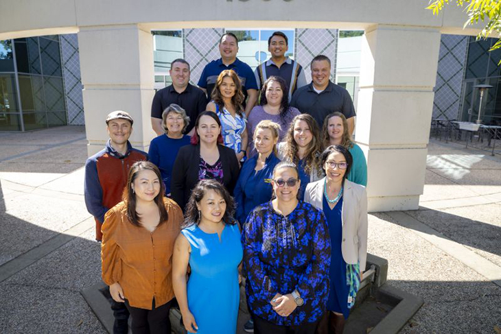 Center for professional practice of nursing team group photo standing outside their office.