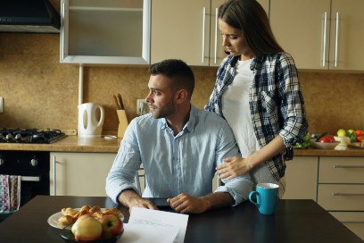 Couple at a table thinking