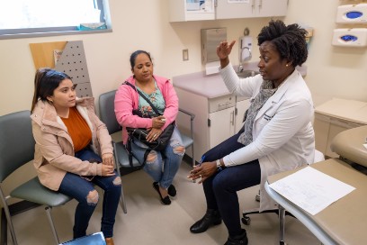 Doctor discussing with patients