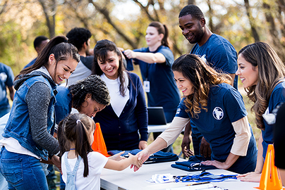 Group of community volunteers around a table