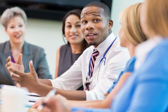 Group of faculty in a learning environment