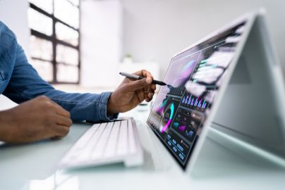 a person looking at data on a computer screen