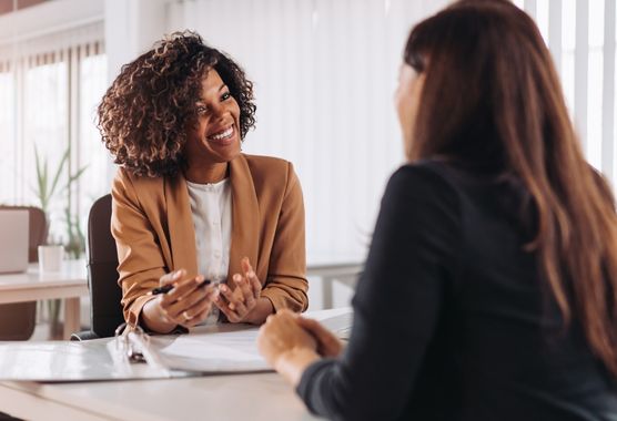two people in a business meeting