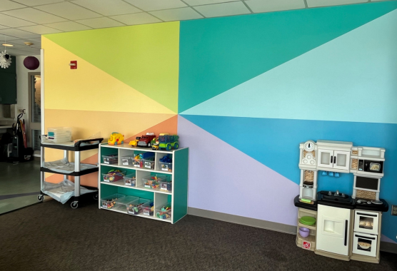Photo of rainbow painted wall in Davis Tower Level 7