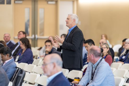 audience members in a meeting for leaders