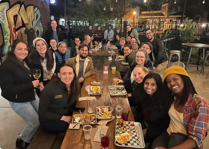 group of residents at restaurant posing for a photo