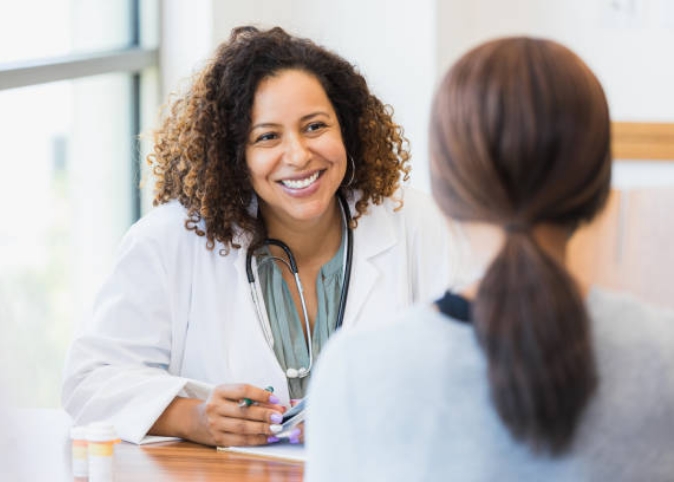 doctor talking with a patient