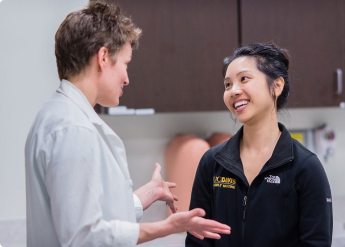 doctor talking to medical student