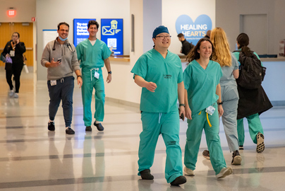 Doctors walking down a hallway.