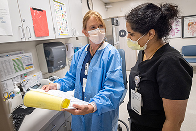 Resident Shivani Shah chats with nurse Lorinda in the GI lab