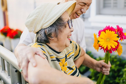 Couple holding flowers