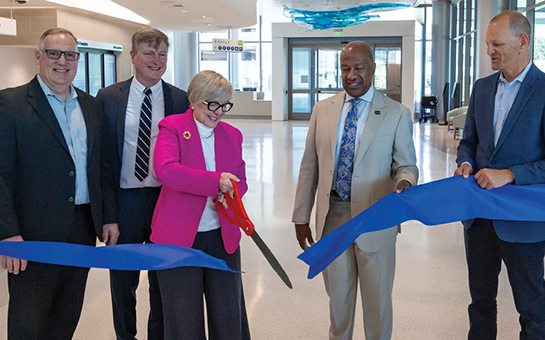 Mike Condrin, Bruce Hall, Diana Farmer, Gary May and Sacramento Mayor Kevin McCarty at the 48X Complex grand opening.