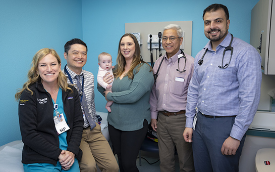 Lillian Hodgkins with family and her care team